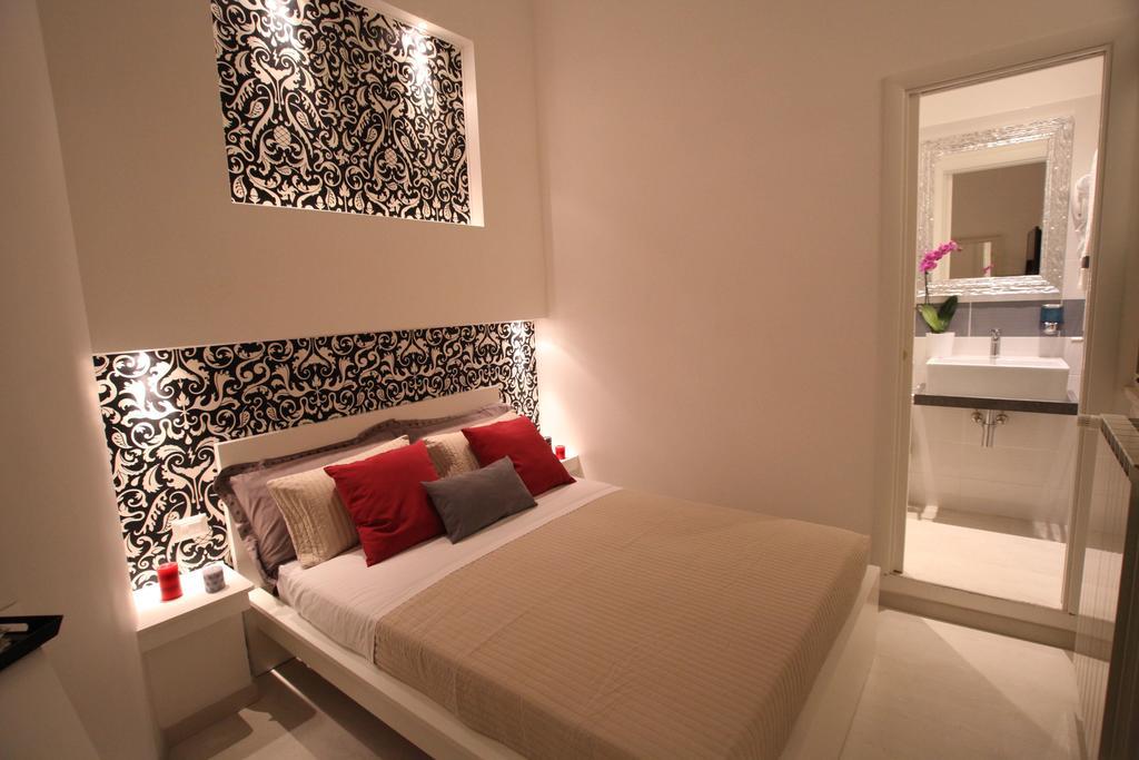 Interno 7 Luxury Rooms B&B Roma Quarto foto